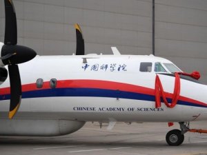 Çin'den iki uçak teslim edip ve bir gözlem uydusu