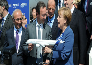 Merkel ve Bakan Elvan açılış kurdelasını birlikte kesti