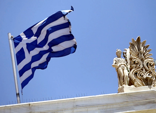 S&P, Yunanistan'ın notunu yükseltti